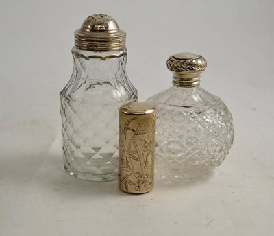 Lot 155 - Two silver topped glass bottles and a Sampson and Mordan scent bottle (3)