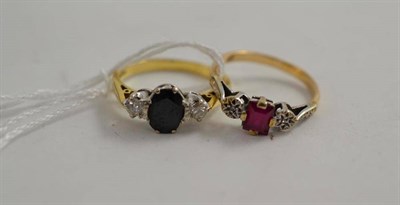 Lot 175 - An 18ct gold sapphire and diamond three stone ring and a dress ring stamped '9ct'