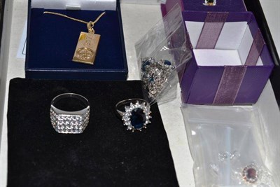 Lot 180 - A 9ct gold ingot on chain, a sapphire ring, silver and costume jewellery