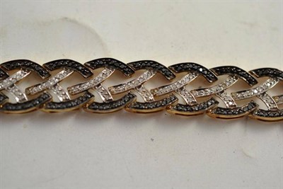 Lot 183 - A 9ct gold black and white diamond bracelet