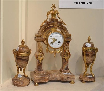 Lot 199 - An ormulu and marble clock garniture in Empire style (reproduction)