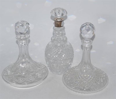 Lot 229 - A modern silver mounted cut glass decanter and two ships decanters