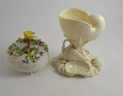 Lot 234 - A Nautilus shell centrepiece and a German floral encrusted circular bowl and cover