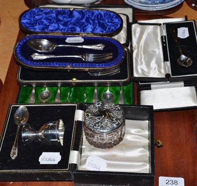 Lot 238 - A collection of silver including teaspoons, egg cup and spoon, in cased sets, etc