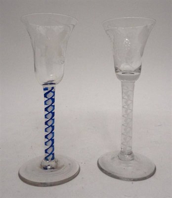 Lot 243 - An 18th century blue and white opaque twist stem glass, another with a plain opaque twist and...