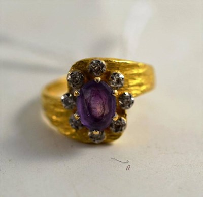 Lot 266 - Amethyst and diamond gold ring