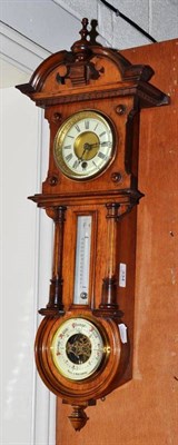 Lot 334 - A combined clock, barometer and thermometer