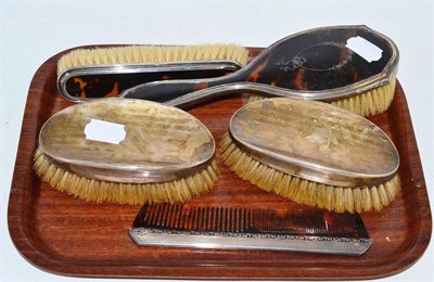 Lot 335 - A pair of silver clothes brushes, silver comb, silver and tortoiseshell hairbrushes and clothes...