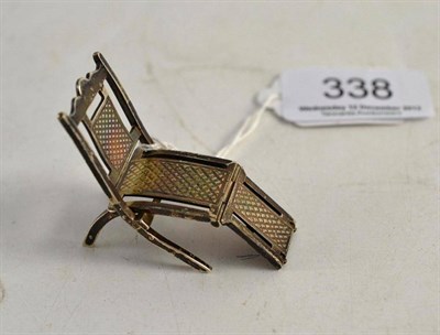 Lot 338 - A sterling folding deck chair by Howard & Co.