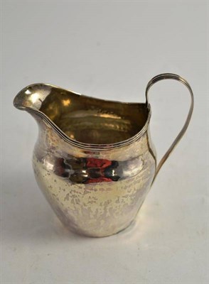 Lot 339 - A Georgian silver cream jug