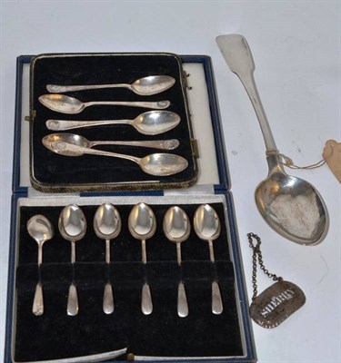 Lot 384 - Georgian silver 'sherry' label, Irish silver serving spoon, a cased set of spoons and a part set of