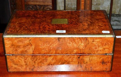 Lot 398 - A Victorian burr walnut writing slope with leather slope and hidden drawers