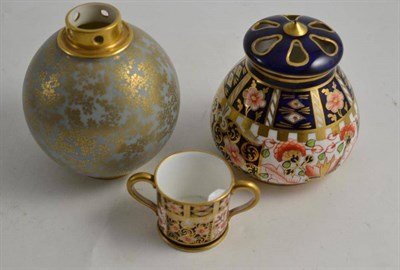 Lot 405 - A Royal Crown Derby Japan pattern pot pourri vase and cover, a similar miniature loving cup and...