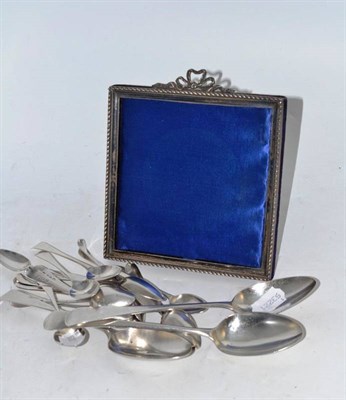 Lot 411 - A collection of Georgian silver spoons and a metal framed photograph frame