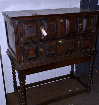 Lot 493 - Circa 1700 oak chest on later stand