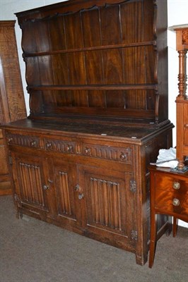 Lot 497 - An oak dresser and rack