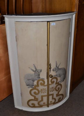 Lot 509 - A cream painted Georgian bow front corner cupboard