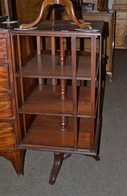 Lot 516 - A mahogany revolving bookcase