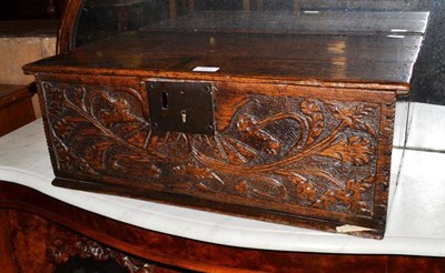 Lot 521 - A carved oak bible box