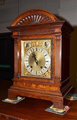 Lot 554 - Oak two train mantel clock