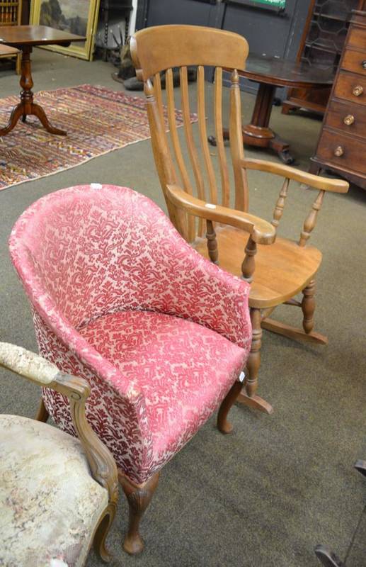 Lot 558 - Pine rocking chair and a pink upholstered tub chair with cabriole legs