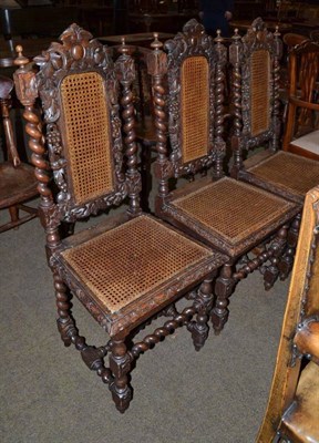 Lot 580 - Three Victorian carved oak chairs with bergere seats and backs