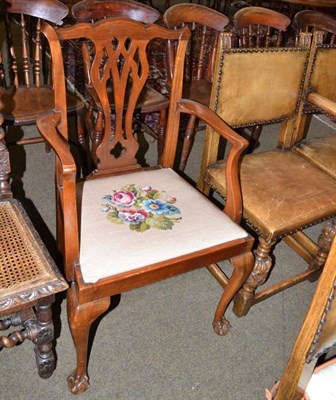 Lot 581 - A mahogany open armchair with woolwork seat