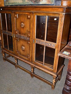 Lot 592 - An oak glazed bookcase