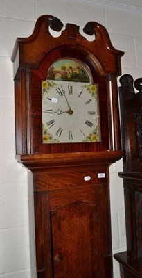 Lot 608 - A oak and mahogany cross banded thirty hour longcase clock with painted arched dial