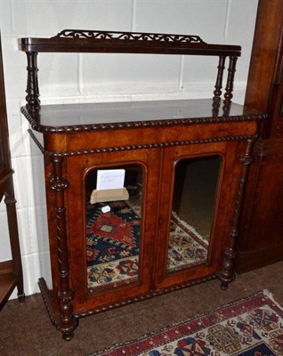 Lot 609 - A walnut credenza base with mirrored doors