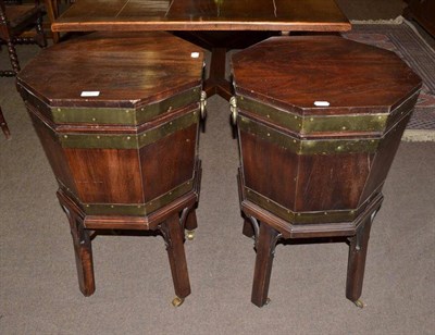 Lot 617 - Two mahogany reproduction cellarettes on brass castors