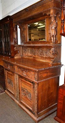 Lot 627 - A late 19th/early 20th century carved oak mirror back sideboard