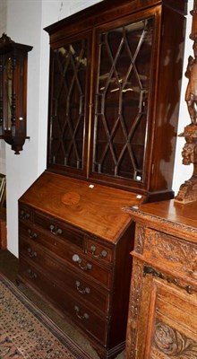 Lot 628 - A 19th century mahogany inlaid bureau bookcase