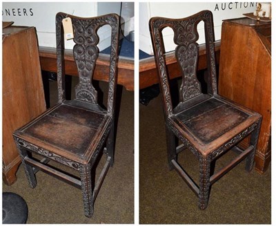 Lot 632 - Pair of carved oak George III chairs