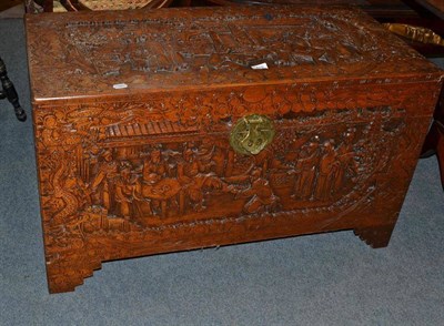 Lot 710 - A carved camphor wood chest