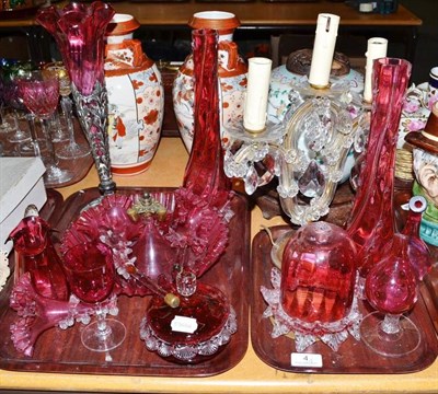 Lot 4 - A quantity of cranberry glass and a three light candelabra (on two trays)