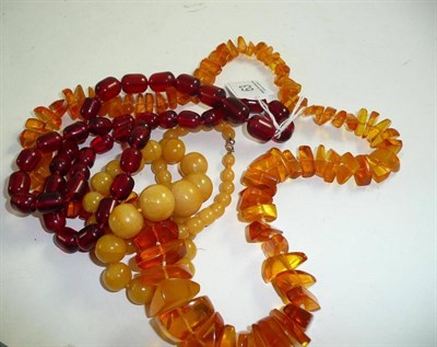 Lot 63 - Three amber type necklaces