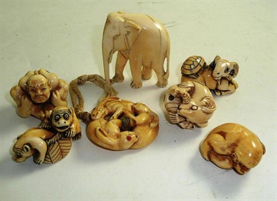 Lot 72 - A group of seven Japanese/Indian netsukes and okimonos, all elephant ivory, circa 1930-1940