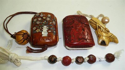 Lot 74 - Two Japanese inros, one circa 1900, the other modern, and a string of ojime beads (3)