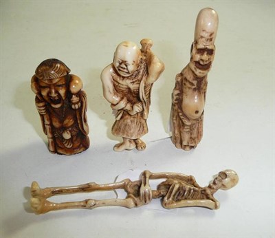 Lot 81 - Four Japanese bone/ivory/antler netsukes circa 1900-1930