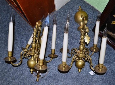 Lot 100 - Pair of Dutch brass four-light wall lights