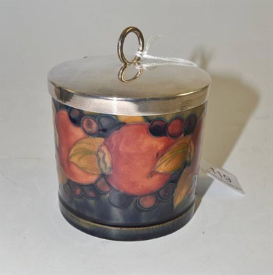 Lot 119 - A William Moorcroft pomegranate preserve jar with plated cover, stamped 'MOORCROFT MADE IN ENGLAND'