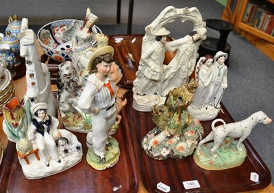 Lot 140 - Nine various Staffordshire figural groups on two trays