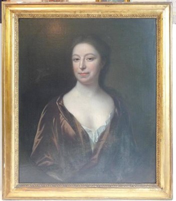 Lot 597 - Circle of Jonathan Richardson (1665-1745) A head and shoulders portrait of a lady wearing a...