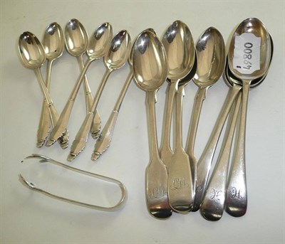 Lot 179 - A set of six silver coffee spoons, two sets of four teaspoons and a pair of sugar tongs