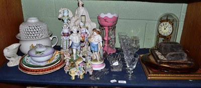 Lot 215 - Shelf of Continental figures, a glass lustre, anniversary clock and other decorative ceramics,...