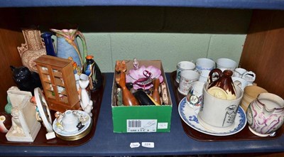 Lot 224 - A shelf of commemorative ware, decorative ceramics, dolls house furniture, wooden animals etc