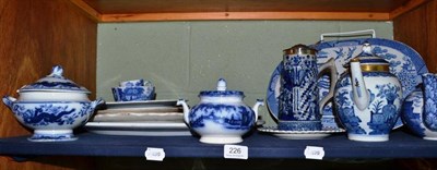 Lot 226 - Shelf of blue and white pottery including meat drainer, teapots etc