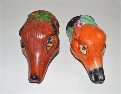 Lot 241 - Two 19th century fox stirrup cups