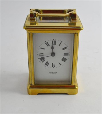 Lot 244 - A brass carriage clock